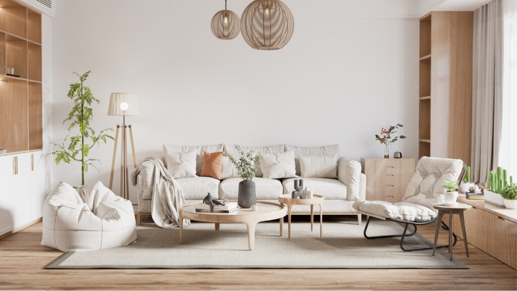 Professional maid service preparing a bright living room with sanitized surfaces and clean seating areas.