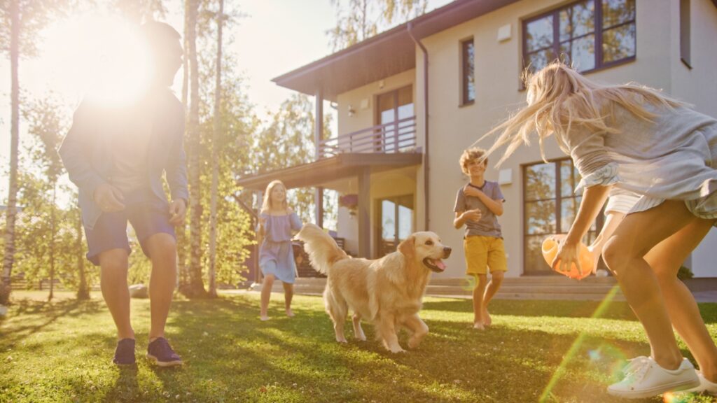 Family enjoying time at home with their dog and local cleaning professionals.